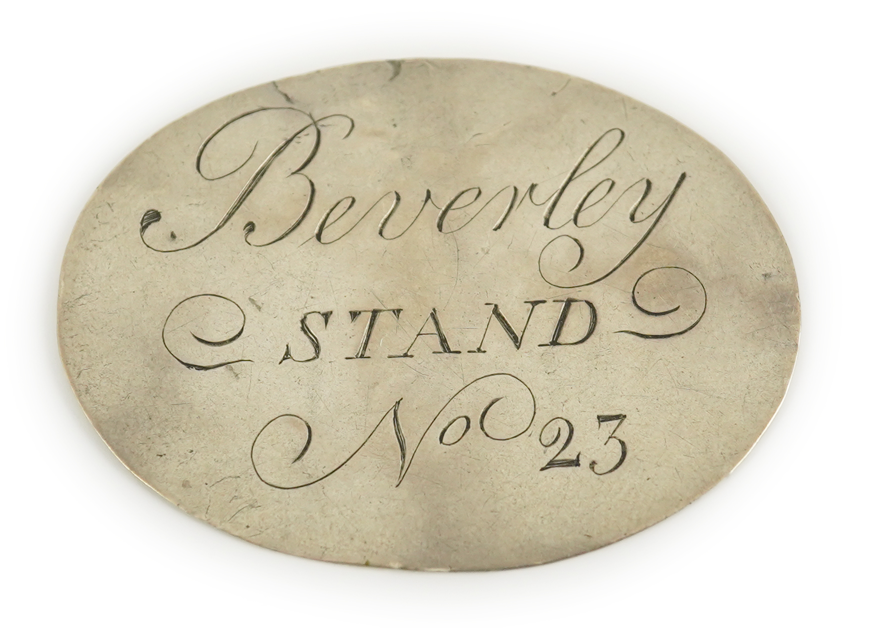 A George III silver Beverley Racecourse Members ticket, inscribed 'Beverley STAND No 23' to one side, monogrammed and dated 1767 the other, 4.4cm.